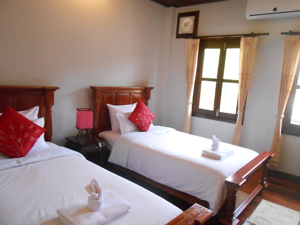 Phounsab Guesthouse Luang Prabang Værelse billede