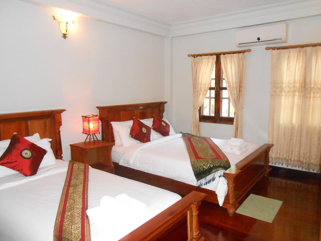 Phounsab Guesthouse Luang Prabang Værelse billede